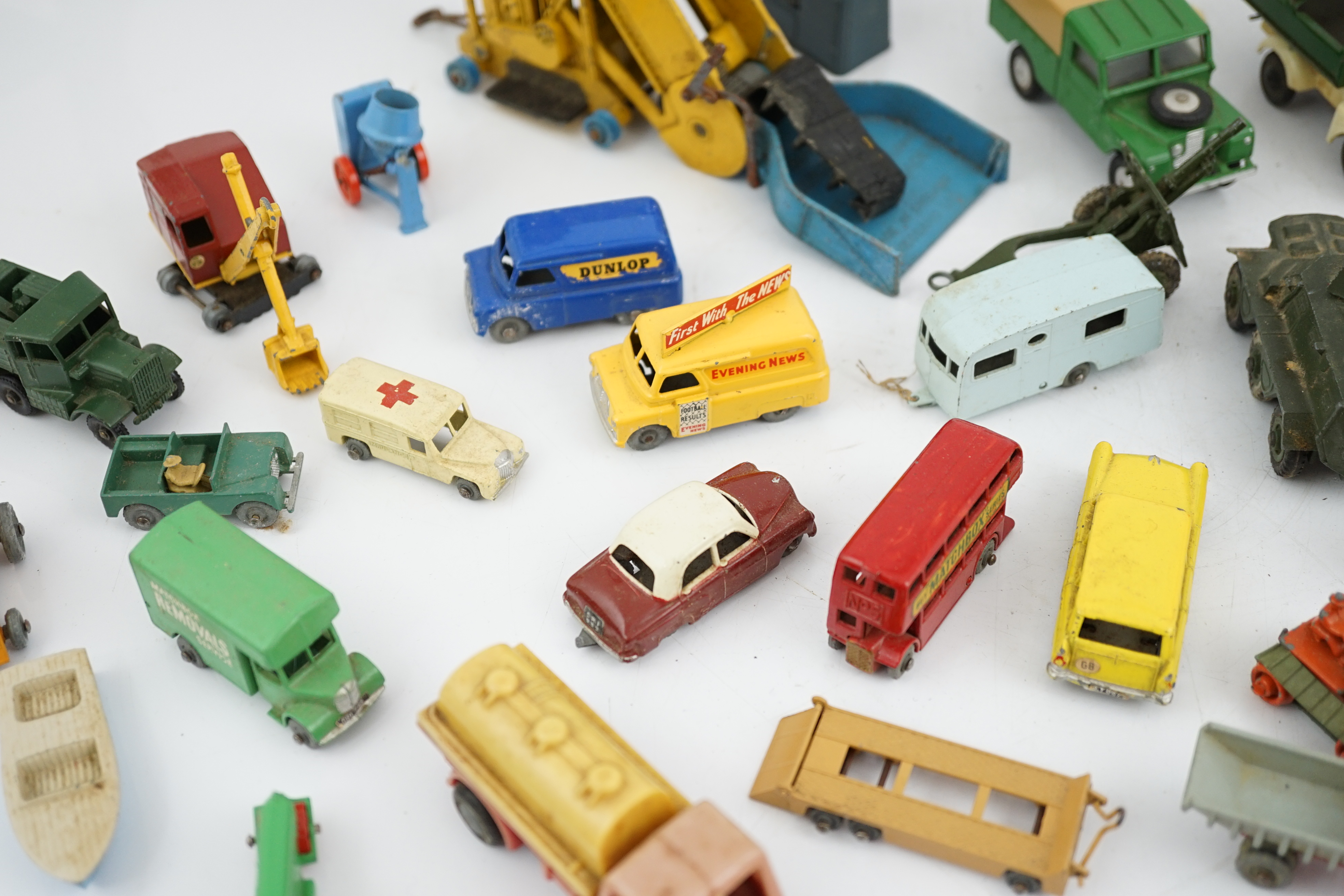 Thirty-eight diecast vehicles by Dinky Toys, Corgi Toys, Matchbox, etc. including a Spot-On BMW Isetta, military Dinky vehicles, Matchbox Series, etc.